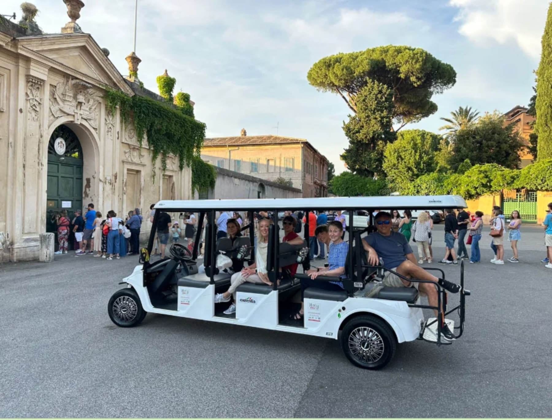 Golden hour view of Rome during an evening golf cart tour